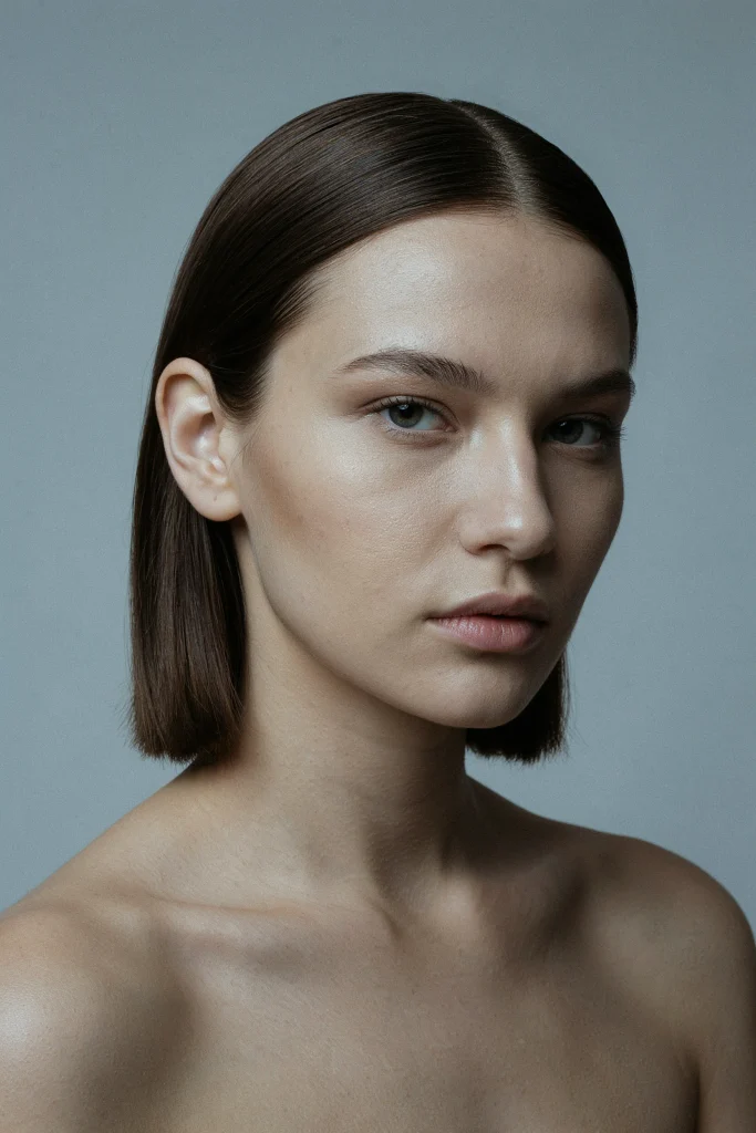 . Blunt Lob with Slicked-Back Styling