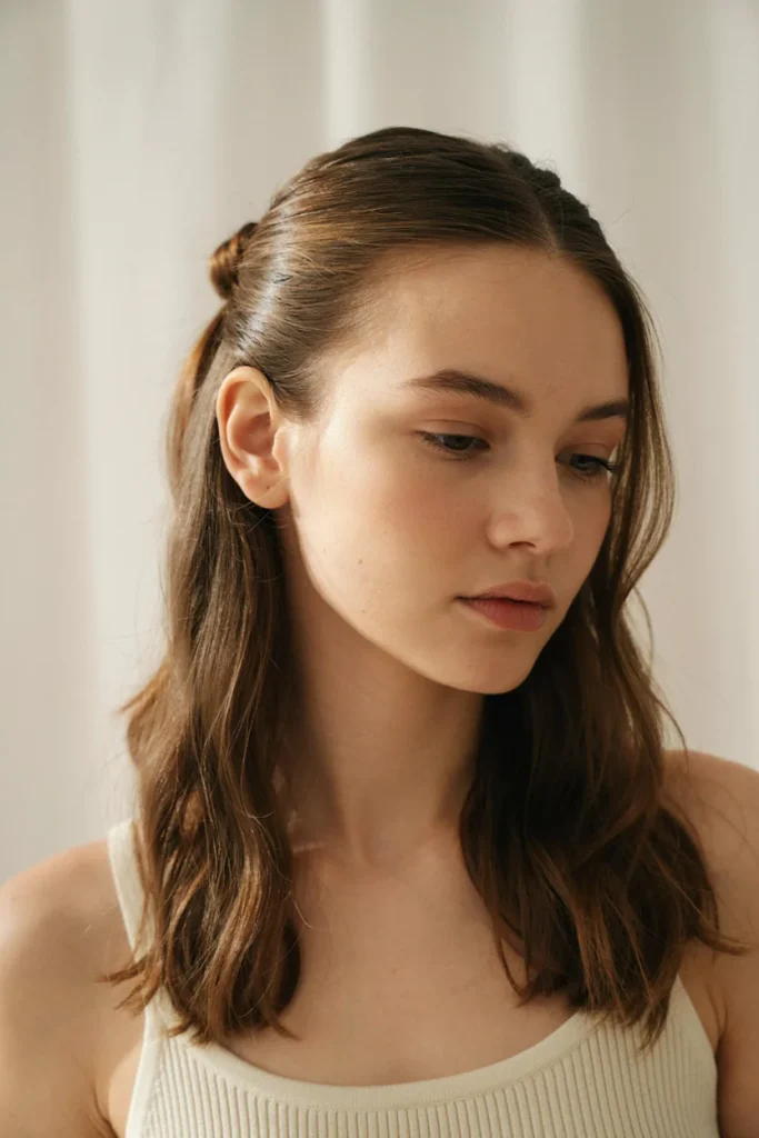 23 Open Hairstyles for a Cute Everyday Look Sleek Ponytail-Inspired Half Style